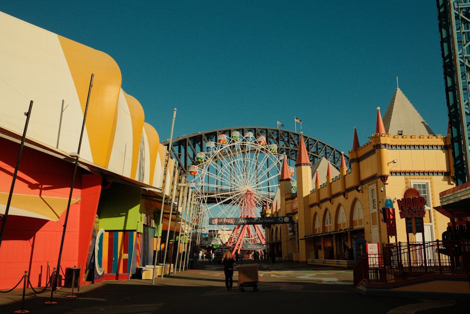 Colorful entrance to Luna Park in Sydney with the iconic Ferris Wheel and architectural details.